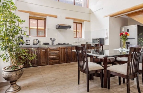 Huaran Casa | Modern and comfortable house with stunning views of the mountains and waterfall.