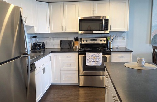 Red Deer Condominio | Modern and Sleek Two Bedroom Condo in Central Location at 307 Checkmate Hill