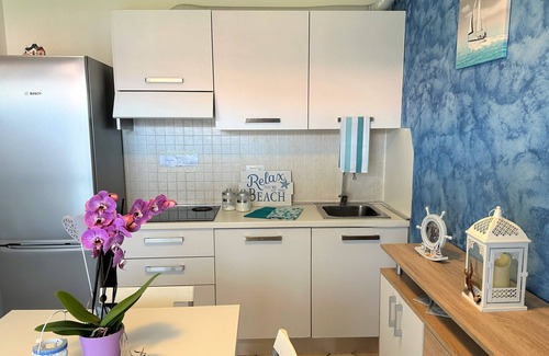 Aprilia Marittima Apartamento | Apartamento moderno con terraza panorámica de Beahost Rentals