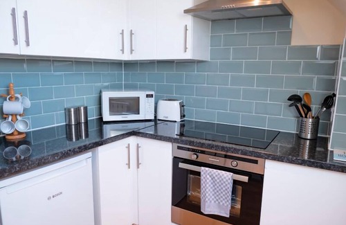 St Sampsons Apartamento | Modern apartment in picturesque north Guernsey, by beautiful bay and Vale Castle