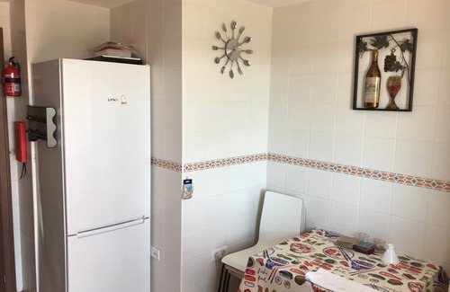 Costa Esuri Apartamento | Apartamento moderno con balcón y azotea con vistas panorámicas