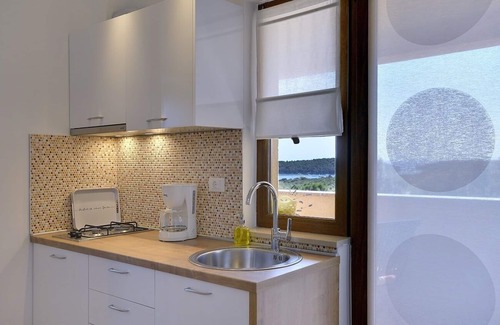 Vinkuran Apartamento | Moderno apartamento con acceso al balcón con vistas al mar