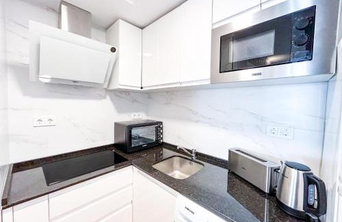 San Luis de Sabinillas Apartamento | Modern appartment with sea views in Sabinillas