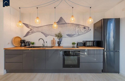 Koelpinsee Apartamento | Modern bluefish hut with balcony - only 800 m to the beach