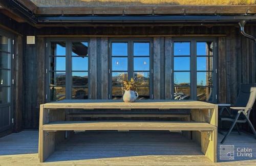Fla Municipality Villa | Modern cabin at Høgevarde panoramic view, fireplace and EV station