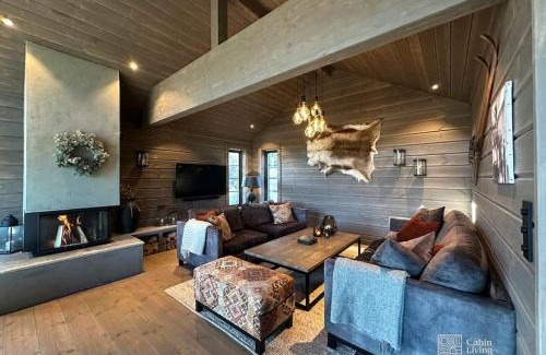 Fla Municipality Villa | Modern cabin at Høgevarde panoramic view, fireplace and EV station