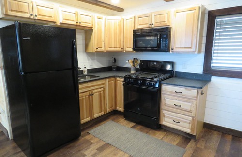 Broadway Cabina | Modern Cabin at the End of the Road, SLIDE, SHUFFLEBOARD!