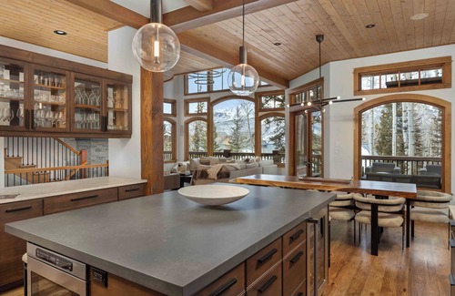 Mountain Village Cabina | Modern Cabin by InvitedHome | Vast Patio, Fireplaces, Hot Tub, Steps to Ski