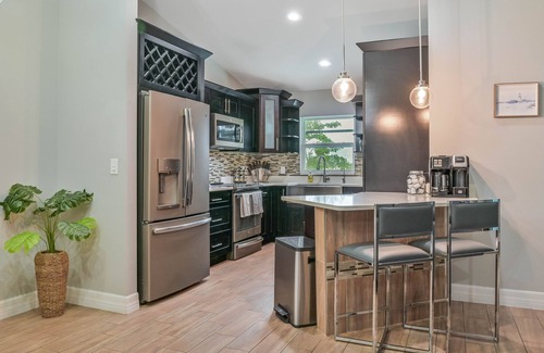 Diplomat Casa | Modern Coastal 3 Bedroom Villa with Salt Water Heated Pool & Office!