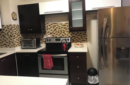 Saint Andrew Apartamento | Modern Comfort Suites