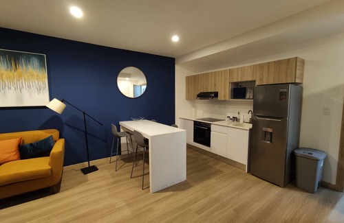 Zona 4 Apartamento | Modern cozy apartment at Zona 4, with work-life style.