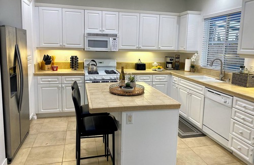 Midway Casa | Modern cozy comforts 4BR 2.5BA home, 2-car garage, outdoor space, monthly rental