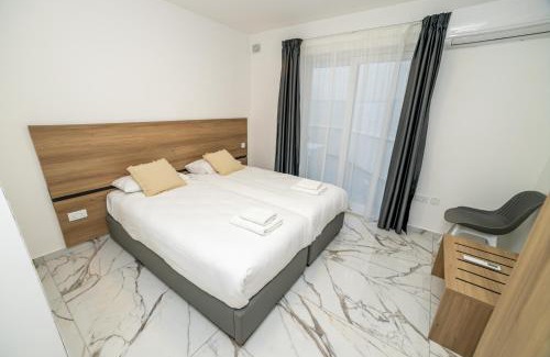 Bugibba Apartamento | Modern Escape 3-Bedroom Maisonette with Free Parking
