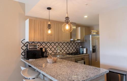 Shaba Apartamento | Modern Ground Level Condo, 2 bedrooms, Direct pool access