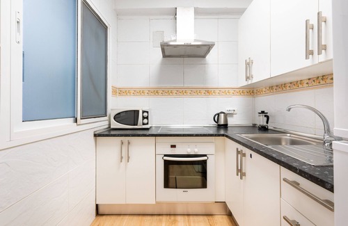 Capuchinos Apartamento | Moderno apartamento " Capuchinos DERECHA " en el centro de la ciudad con balcón, aire acondicionado y Wi-Fi