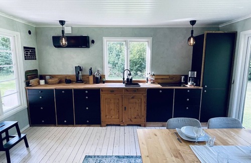 Broby Casa | Modern holiday home on the banks of Helgeån
