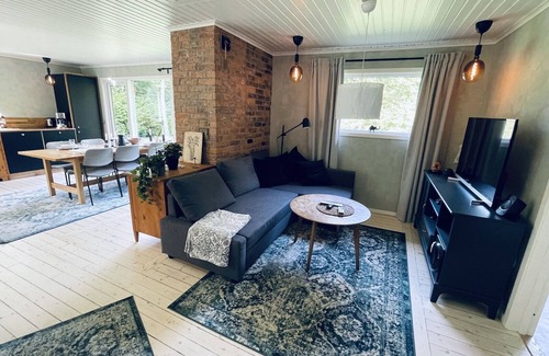 Broby Casa | Modern holiday home on the banks of Helgeån