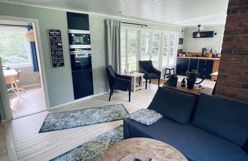 Broby Casa | Modern holiday home on the banks of Helgeån