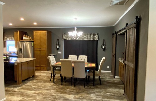 Marinette Casa | Modern Home on Trout Creek in Peshtigo “Fire City” w/ Spacious Backyard & Deck!