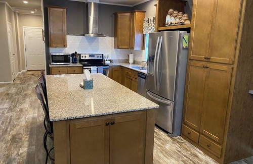Marinette Casa | Modern Home on Trout Creek in Peshtigo “Fire City” w/ Spacious Backyard & Deck!
