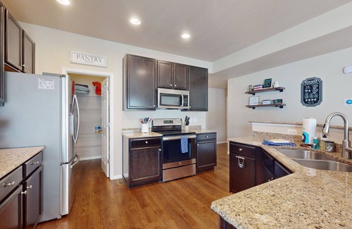 Fountain Casa | Modern home with fenced yard, firepit, foosball & WFH desks