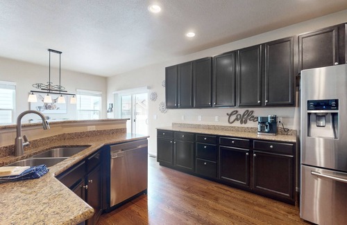 Fountain Casa | Modern home with fenced yard, firepit, foosball & WFH desks
