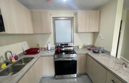 Eden Gardens Apartamento | Modern Kingston Apartment Suite With Pool & Ocean View