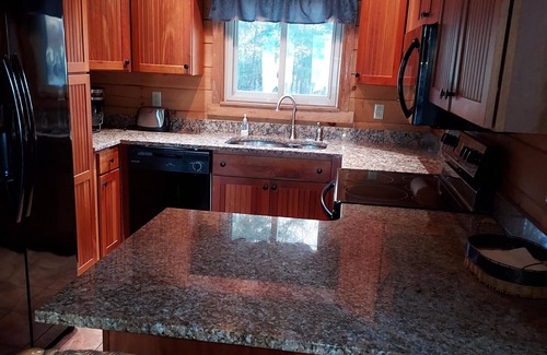 Oakland Cabina | Modern lakeside log cabin on pristine East Pond Oakland Maine's Belgrade Lakes