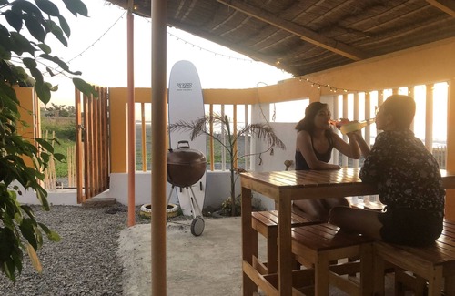 Bacnotan Apartamento | Modern, Long Stay Studio Suite in a beachfront resort.