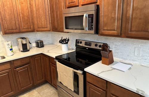 Mobile Casa | Modern lower level midtown apartment with cable and high speed internet!