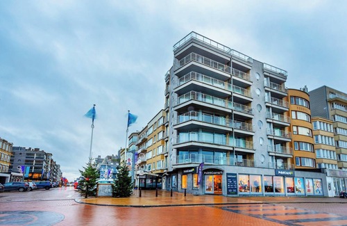 Koksijde-Bad Apartamento | Apartamento esquinero en primera línea de mar.
