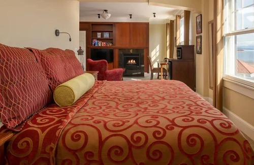 Astoria Hotel | Modern Meets Victorian: Room w/ Handcrafted Cabinetry & Heated Tile Floors