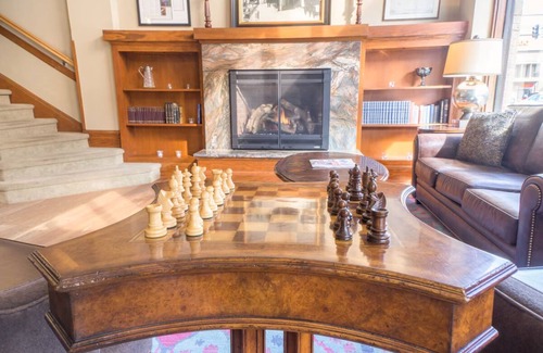 Astoria Hotel | Modern Meets Victorian: Room w/ Handcrafted Cabinetry & Heated Tile Floors