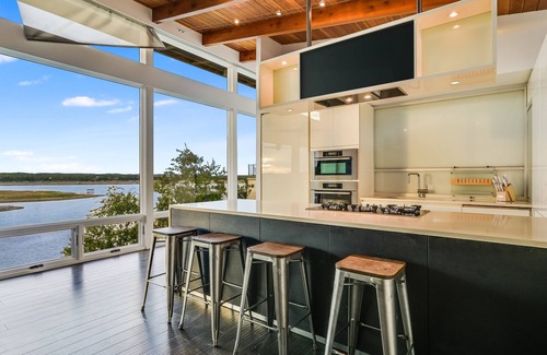 Buffalo Gap Casa | Modern Midcentury Lakefront with pool, hot tub, & private boat dock/Boat rentals