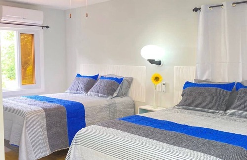 Isla de Utila Cabina | Habitación Moderna con Aire Acondicionado en la Isla de La Bahia Utila