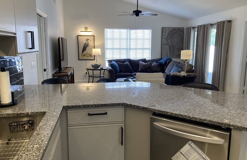 Vero Beach Casa | MODERN RETREAT: 2/2, w/private study, garage, screened patio, and front porch.