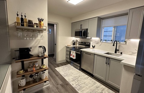 Woodbine Gardens Casa | Modern retreat in the city w/firepit, covered back porch, in suite laundry, WFH,
