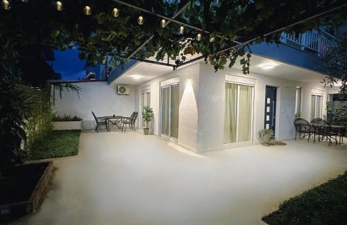 Olymbiaki Akti Casa | Modern Seaside Retreat with Private Patio and Parking - Blue Zone Homes