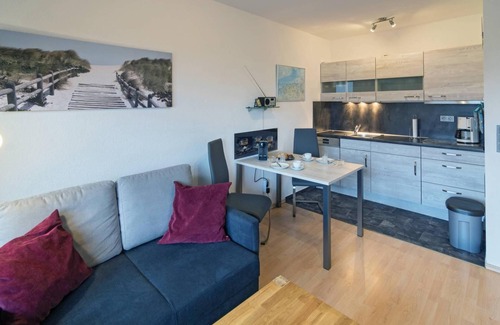Dornum Apartamento | Modern upper apartment Asgard with a view of the canal