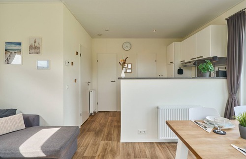 Suesel Casa | Modern vacation home Sunshine am See in Seeparx Süsel with terrace and WLAN