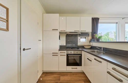 Suesel Casa | Modern vacation home Sunshine am See in Seeparx Süsel with terrace and WLAN