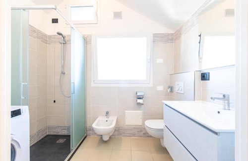 Lignano Sabbiadoro Villa | Modern villa with jacuzzi close to the beach by Beahost Rentals