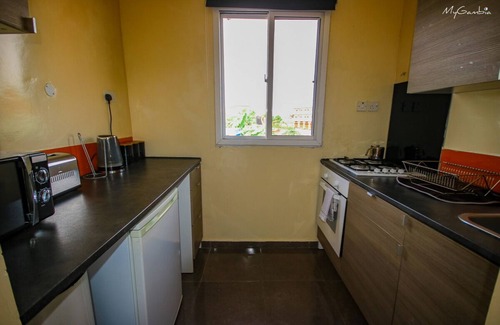 Brusubi Apartamento | Modern Well run Apartments with pool, walking distance to the beach
