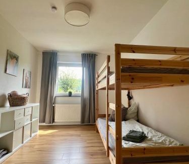 Pruem Apartamento | Moderne familienfreundliche Wohnung am Waldrand von Prüm mit Terrasse