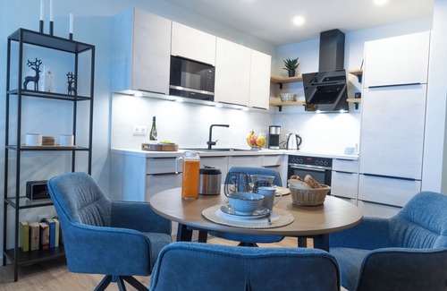Dorumer Neufeld Apartamento | Moderne Ferienwohnung mit Balkon und Sauna in Strandnähe