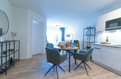 Dorumer Neufeld Apartamento | Moderne Ferienwohnung mit Balkon und Sauna in Strandnähe