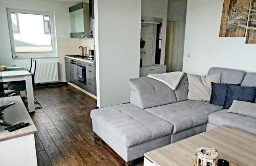 Ziemitz Apartamento | Moderne Ferienwohnung mit Balkon direkt an der Peene