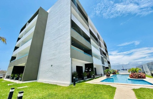 Villa Marina Condominio | moderno con alberca cerca de la playa by Gpsrentas