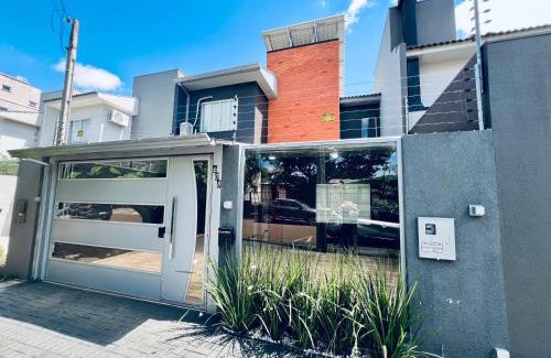 Santa Cruz Casa | Moderno Sobrado Climatizado com Ar Quente e Frio