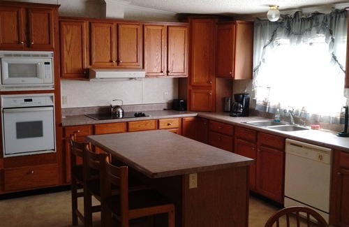 Board Camp Casa | Modest 3-bedroom house near Wolf Pen Gap and the Ouachita National Forest.